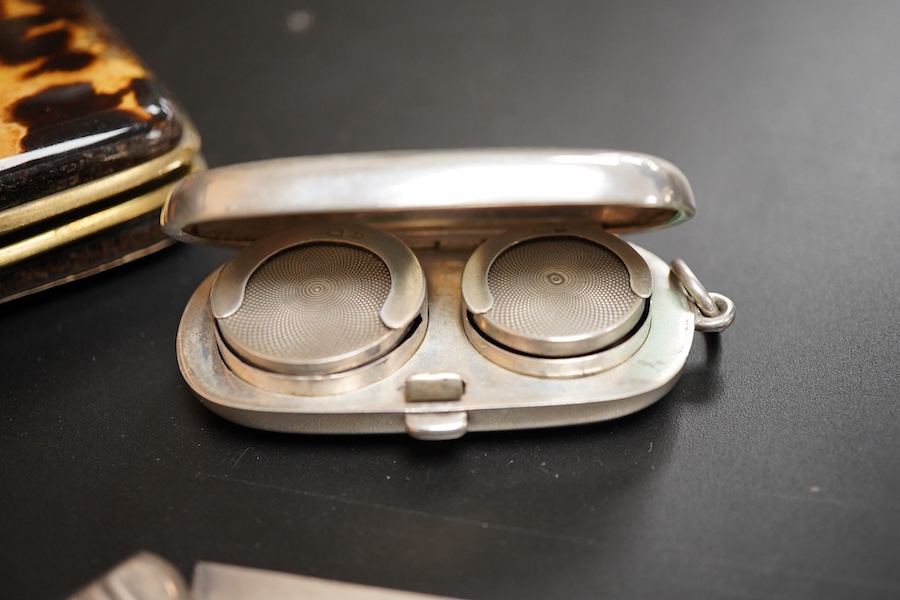 An Edwardian silver sovereign/half sovereign case, William Neale & Sons, Chester, 1906, 61mm, together with a mother of pearl handled silver fruit knife, a tortoiseshell purse and a shell mounted pen knife.
